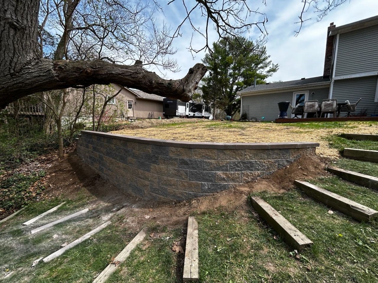 Erosion Fix with Block Wall in Pinckney