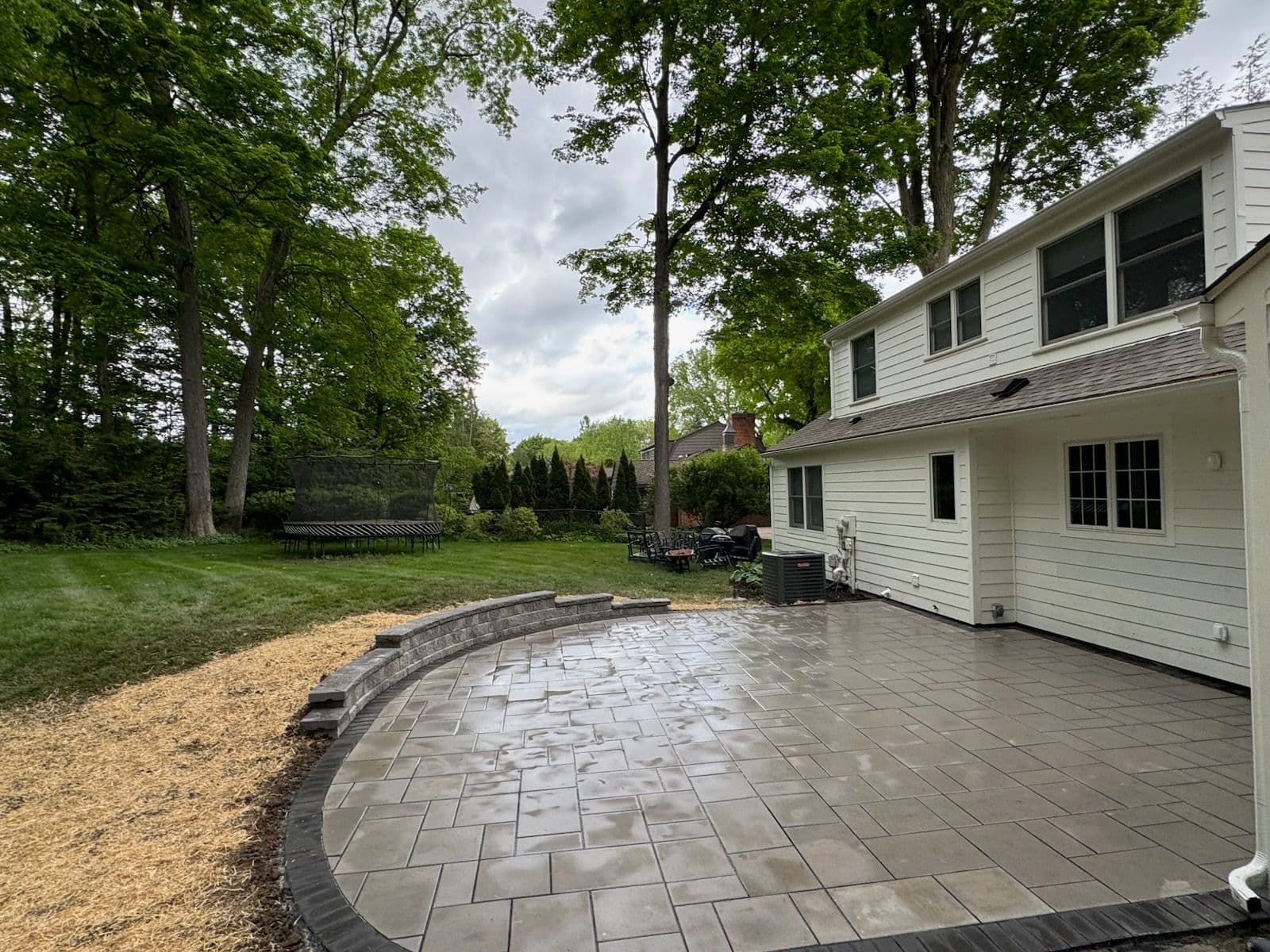 Unilock Patio Transformation for Ultimate Backyard Bliss image